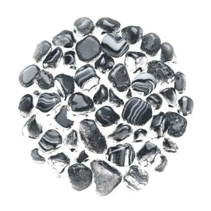 A gathered group of black onyx: polished tumbled stones, a banded slice and carved pieces, flat black with pale banding.